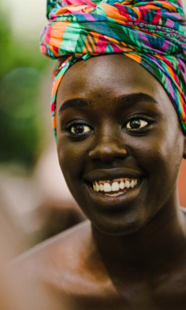 Image features a close up of a Ghanaian woman.