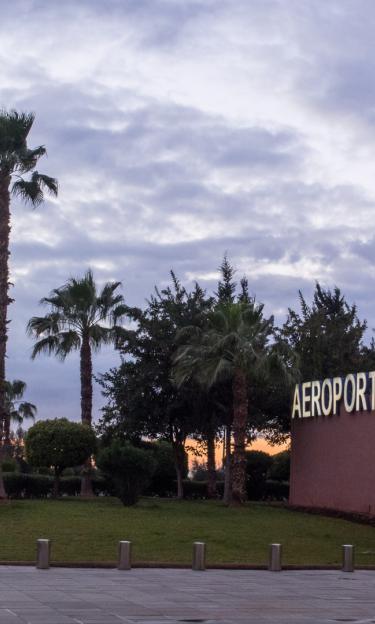 Image features Marrakech airport sign