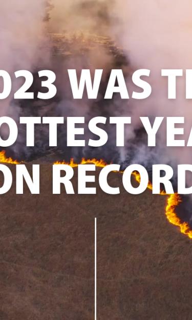 Burning fields with text '2023 was the hottest year on record"